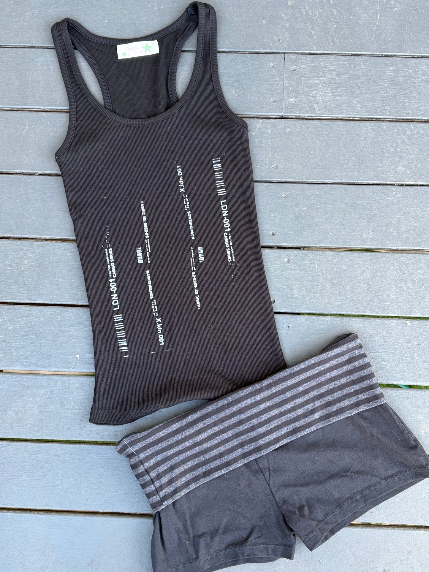 The grey striped shorts