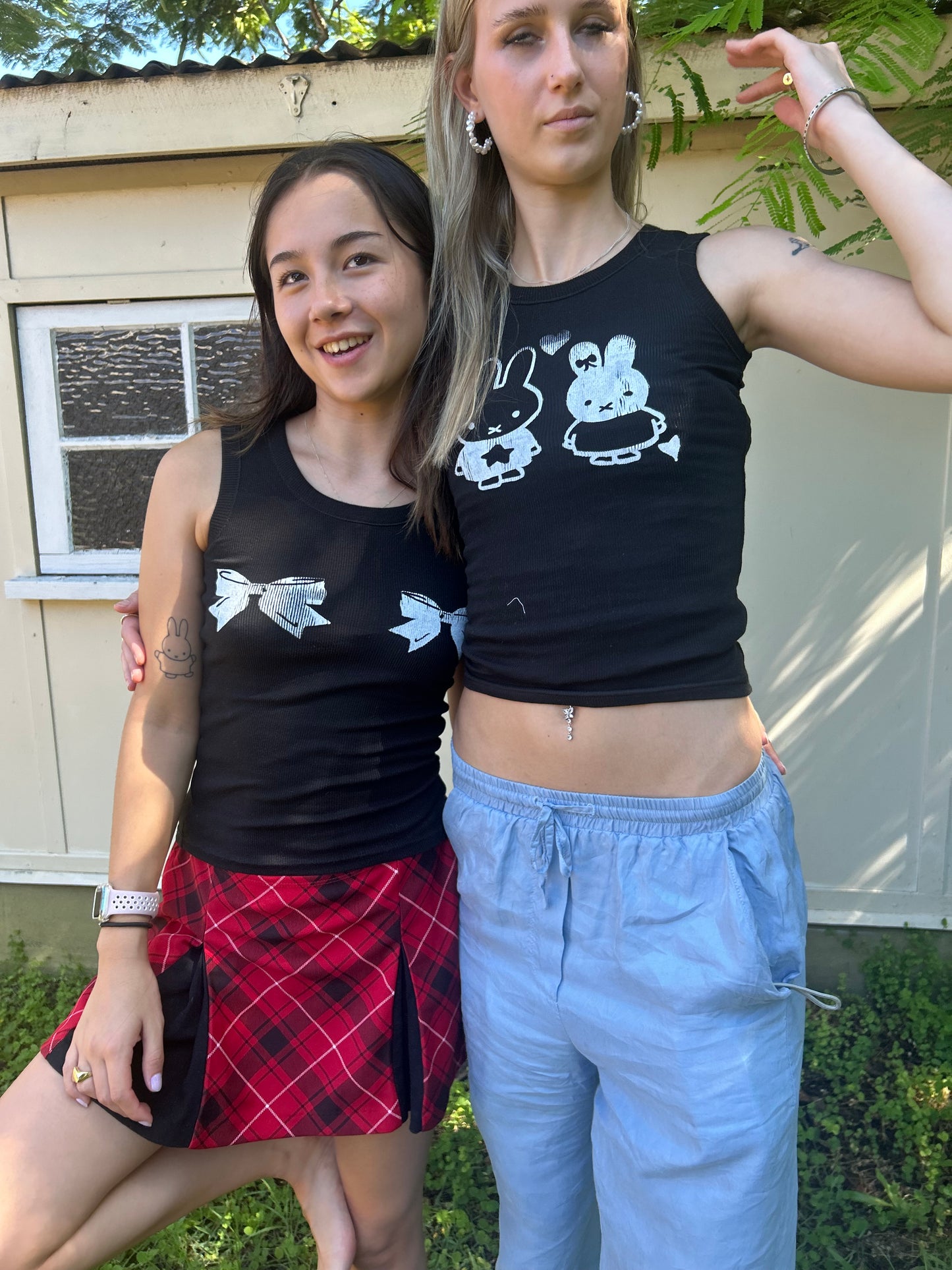 The bow nipples tank top in black